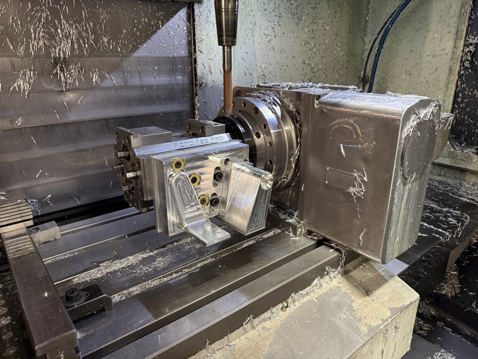 Custom two-sided production fixture on the rotary table